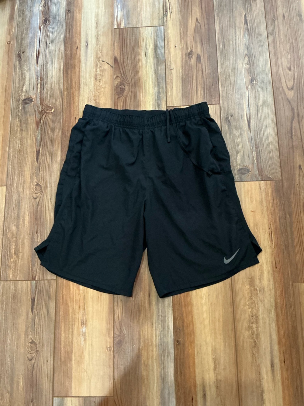 Nike Men's Black Athletic Shorts with Silver Swoosh